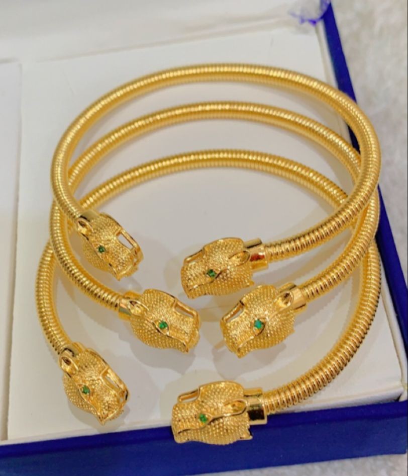 Bracelet Cartier En Or Jaune Vintage A Double Tête Panthère Avec Onyx Et Diamants